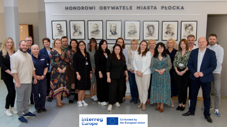 Representatives from various local organizations pose for a group photo at the first Płock Local Stakeholders Meeting.