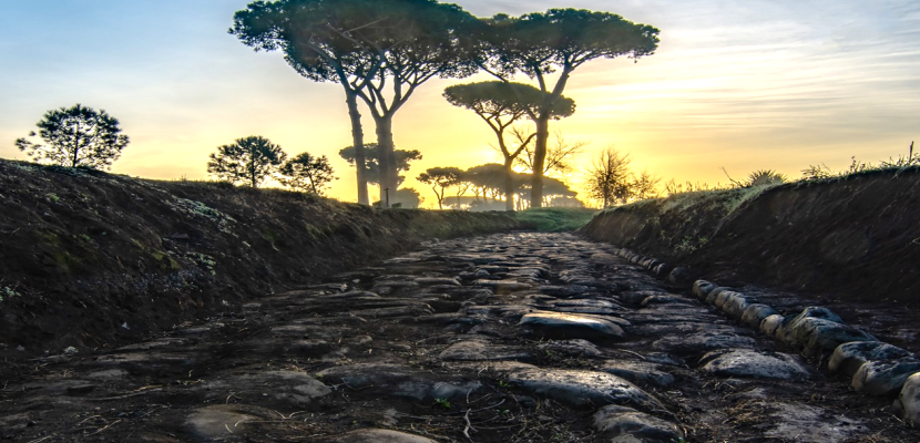 Sunset on the Ancient Appian Way View of a sunset from the Ancient Appian Way, with some trees in the background