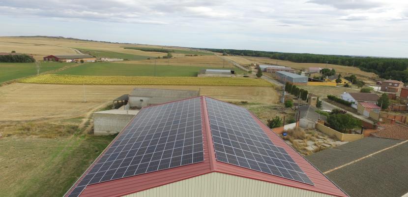 Solar panels located on the roof of an agricultural warehouse, in La Serna, Palencia