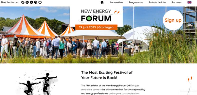 New Energy Forum People around tents in an open air event
