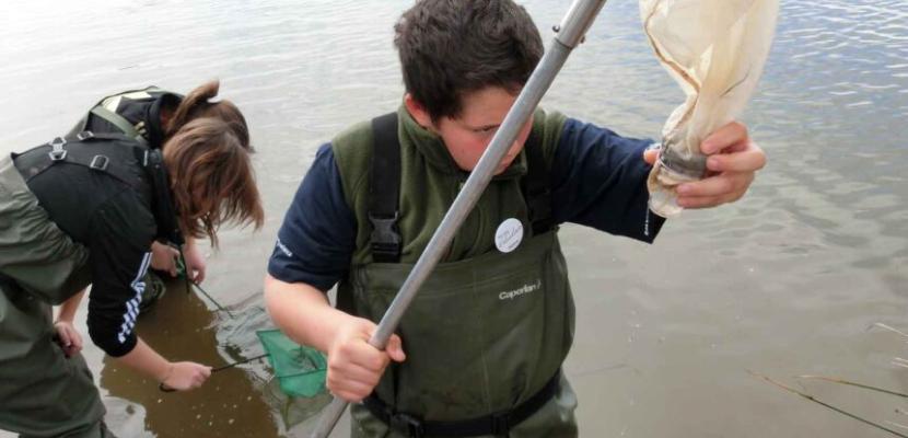 People sampling rivers