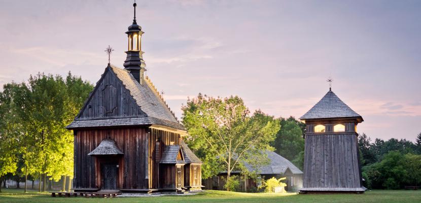 The wooden church from Rogów & Bell tower from Kazimierza Wielka In the picture I can see the wooden church from Rogów founded in 1763 and Bell tower from Kazmierza Wielka - copy of the most valuable bell from Kazimierza dated 1776