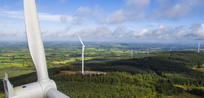 Slieve Bawn Wind turbines an arieal picture looking at wind turbines and a forest