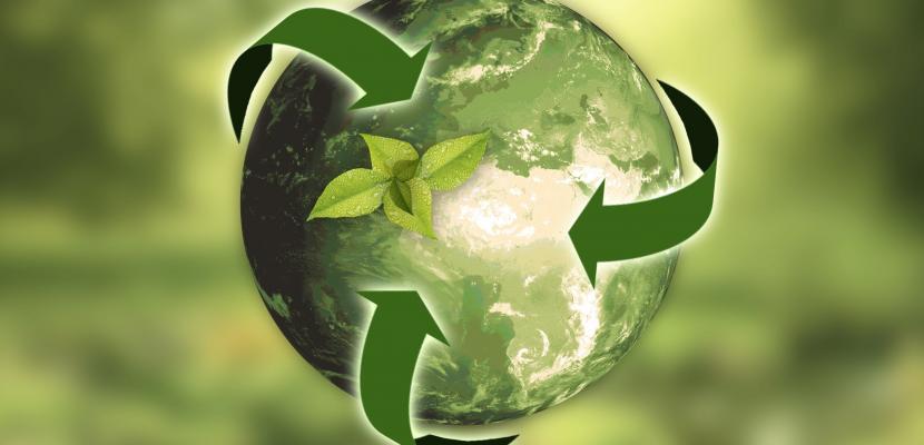 Illustrative picture for Climate and Circular Economy Road Map of South Ostrobothnia. Illustrative picture. A globe surrounded by recycling logo arrows.