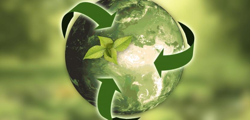 Illustrative picture. A globe surrounded by recycling logo arrows.