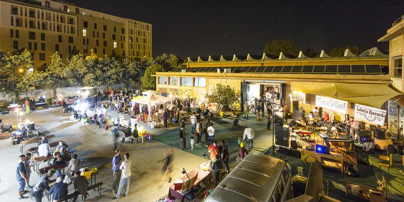night view of an outdoor space filled with young people