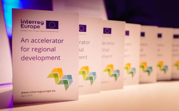A range of booklets saying "an accelerator for regional development"