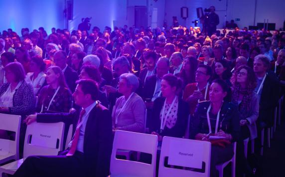 Audience listening to presentation