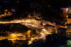 Village view from the sky in the night with few lights Village view from the sky in the night with few lights