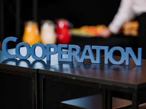Cooperation