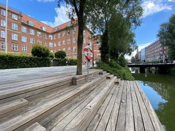 Overview of a canal from wooden steps