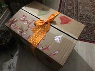 Carton box wraped in a lace.