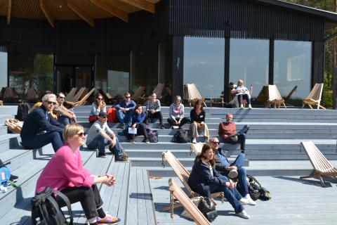 People sitting under the sun