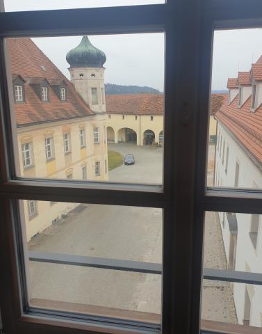 Monastery courtyard with convent buildings, parts of the guest house, the bookshop and the farm store