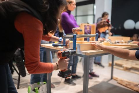 A group of people repairing