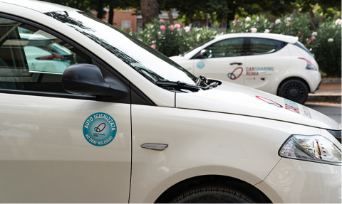 car-sharing car in Rome with the sticker highlighting the sanitation service inside the vehicle car-sharing car in Rome with the sticker highlighting the sanitation service inside the vehicle