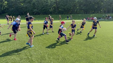 Childern playing regby in Šilute stadium