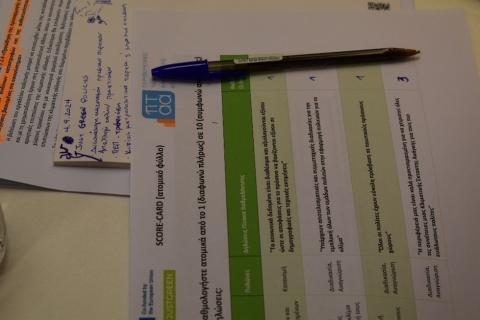 Attica Stakeholder meeting 1 Filled out scorecard with pen on a desk