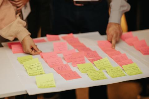 Stakeholder workshop i see 2 hand and many notes