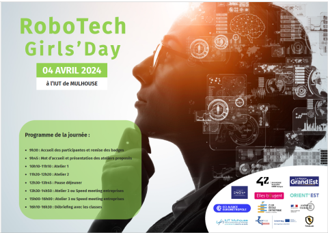 RoboTech Girls' A woman in the background with the event programme and partner logos