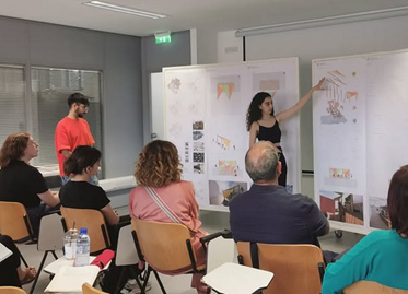 Workshop's participants co-creating their neighboourhood Workshop's participants co-creating their neighboourhood
