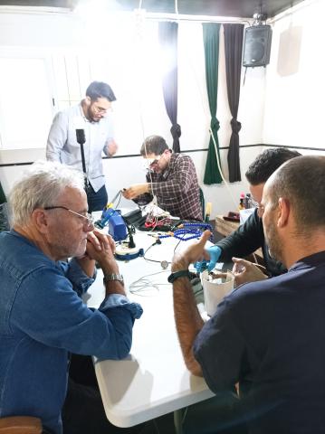 Repair cafe Repair cafe where people learn how to fiz their home equipments such as coffee machines