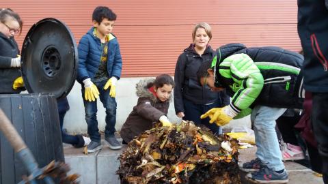 Pupils learning how to compost 1