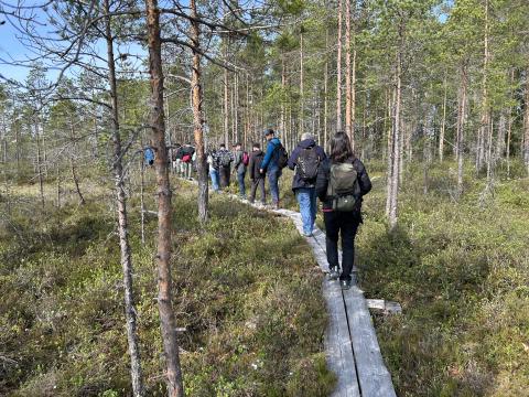 Riwet trekking through forest wetlands in Lintuneva Riwet in Lintuneva