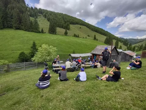 people on a meadow study visit