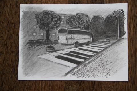 design of the bus stop next to the collaborative painting of the piano keyboard