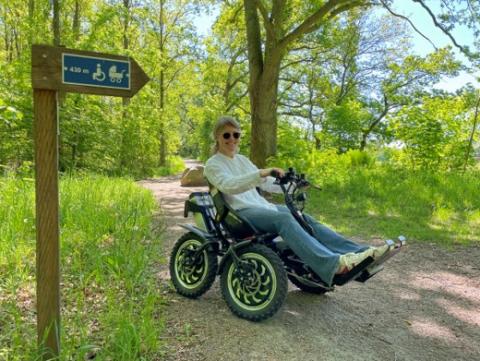 Testing an all-terrain wheelchair in an accesible trail in Kullaberg NR Testing an all-terrain wheelchair in an accesible trail in Kullaberg NR