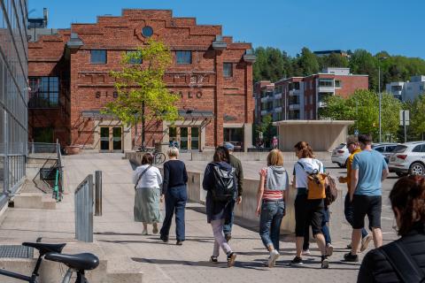 Third study visit to Finland People walking towards building