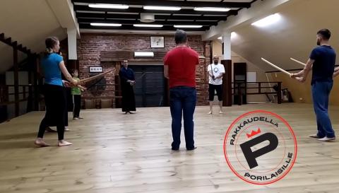 Free kendo courses funded with well-being money People practicing kendo indoors