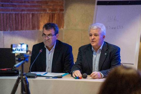 Partners meeting introduction, 2 people speaking