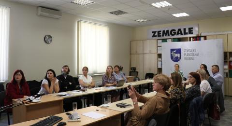 Zemgale Planning Region meeting with CCI stakeholders Particpants sitting at meeting tables