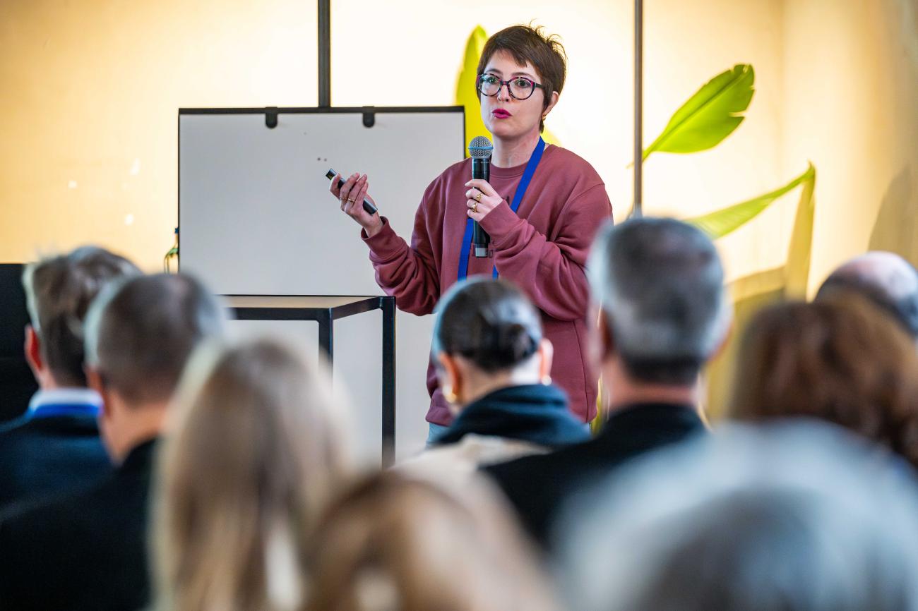 Woman presenting during Policy Learning Platform workshop at Europe, let's cooperate 2024