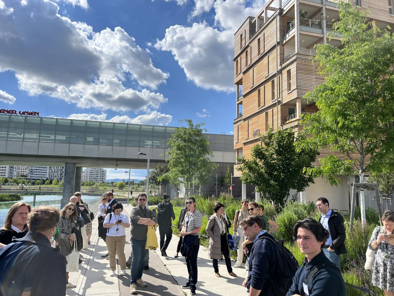 people walking outdoor next to a building