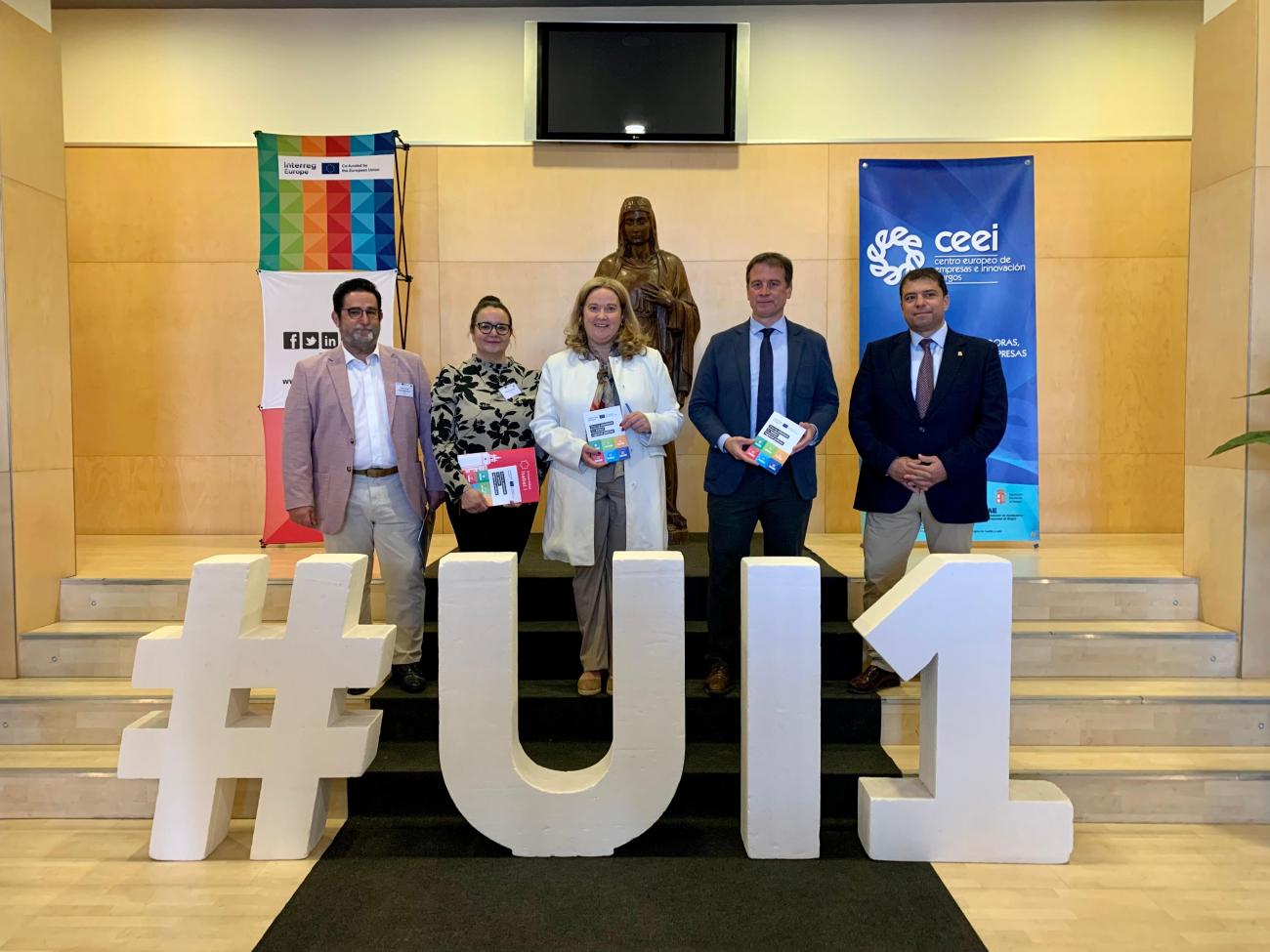 Official picture of five people in a university Official picture of five people in a university