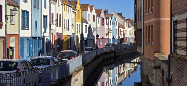 The City of Amiens River and houses along a river in Amiens