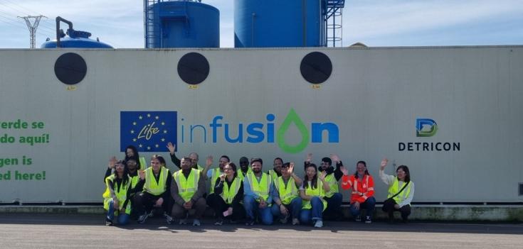 Students in Asturias in front of project poster students in front of poster