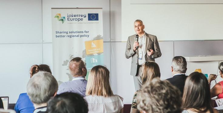 What is Interreg Europe 7 Erwin Siweris, director of Interreg Europe giving a presentation at an Interreg Europe project seminar in Sofia