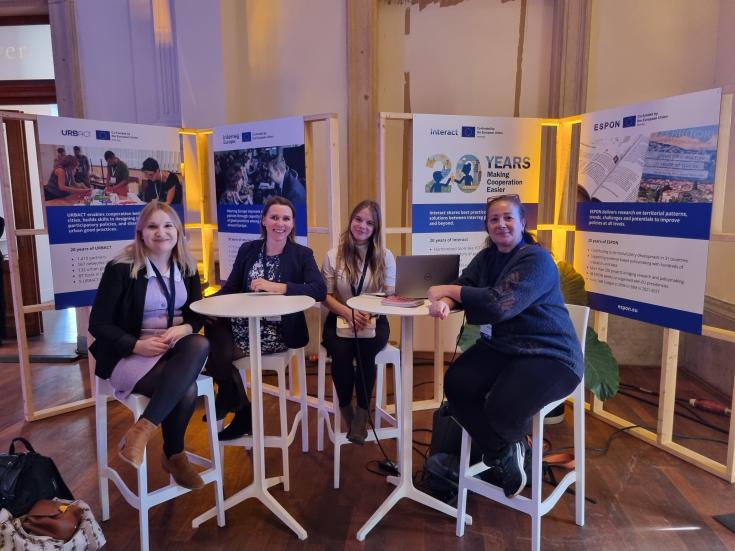 group of people at an exhibition stand