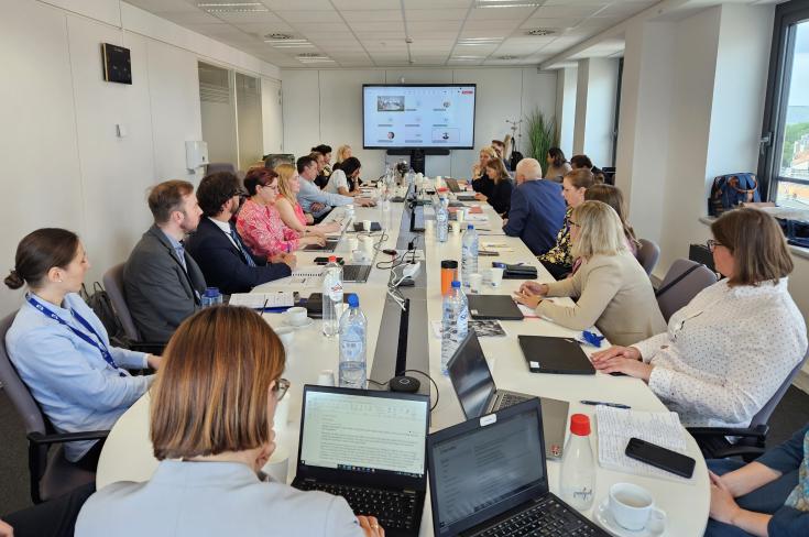 Regio-Silience partners meet in Brussels a group of people seating at a table