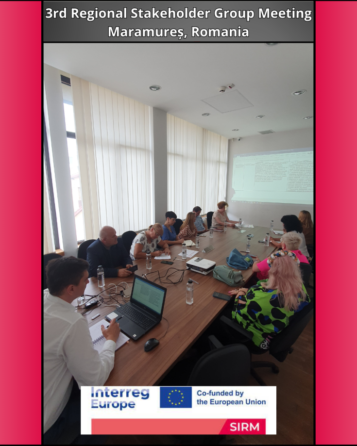 3rd Regional Stakeholder Group Meeting - Maramureș, Romania Meeting participants seated around a table in a conference room during a presentation, projected in the background.