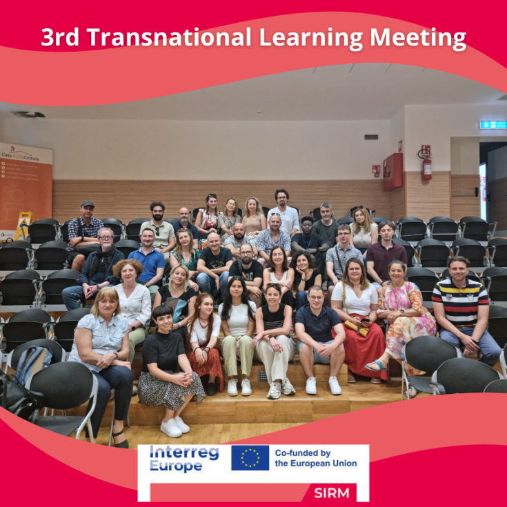3rd Transnational Learning Meeting in Brindisi A group of people sitting on chairs in the hall and posing for a photo