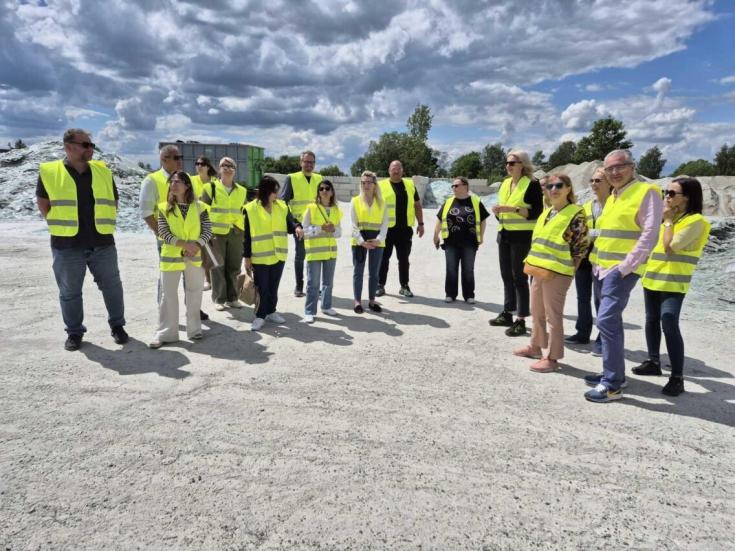 Group of people in recycling center to make a visit