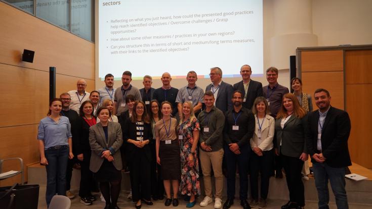 Interreg Europe community members gathered in Bilbao to exchange their experiences on industrial transition processes. A group photo of the event.