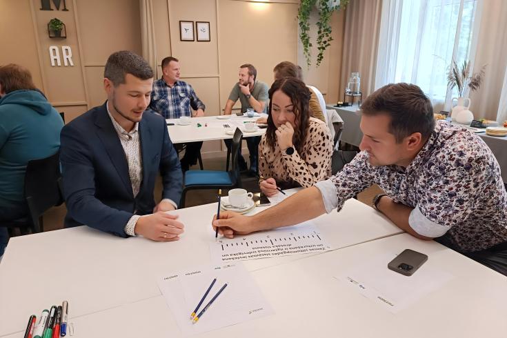 People taking part in stakeholders meeting discussing low temperature heating solutions for Vidzeme Region.