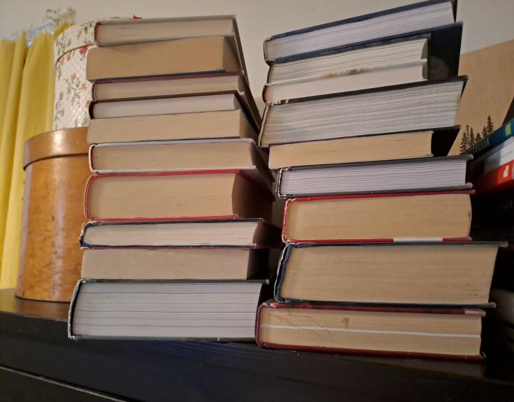 The importance of literacy The picture shows two piles of books.