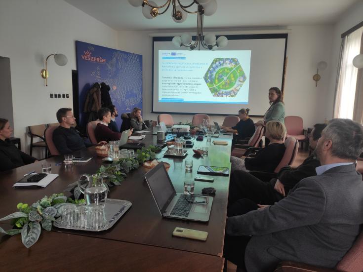Stakeholder group in Veszprém listening and watching PROXIMITIES presentation Stakeholder group in Veszprém listening and watching PROXIMITIES presentation